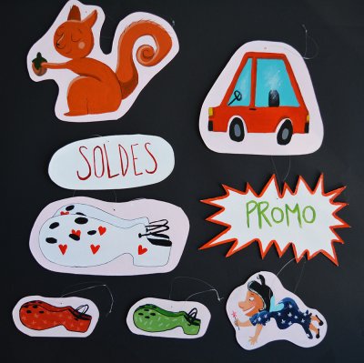 15 Minis-décors montés sur anneaux et fil nylon, destinés à la mise en place d'une scénographie aérienne pour l'histoire de Croquillon.