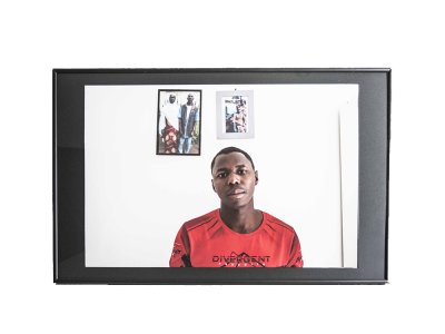 Tirage Fine-Art encadré d'Oumar Dimensions (Lxh) : 45x30cm.